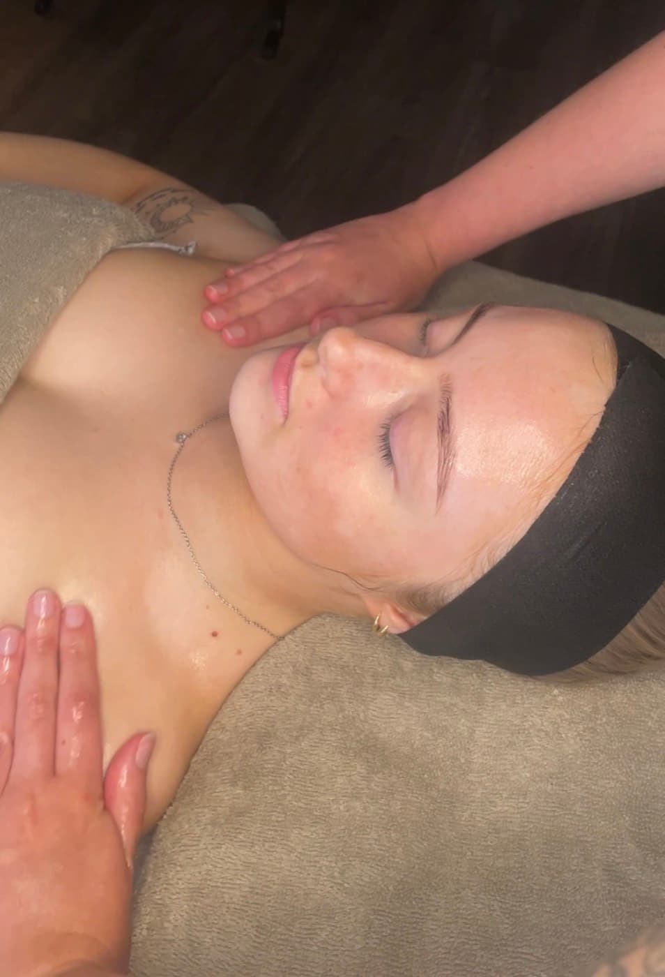 Calm facial massage on the décolleté during a treatment at Fresh Faced Skin Clinic in Scartho, Grimsby.